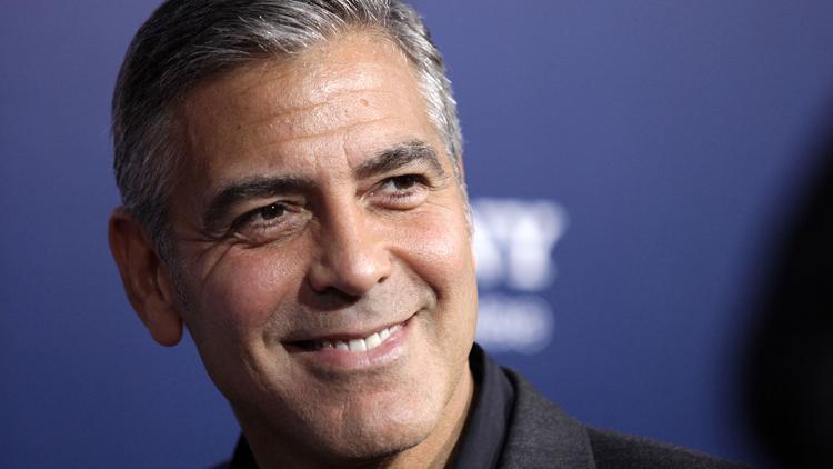 clooney in aurora prize ceremony